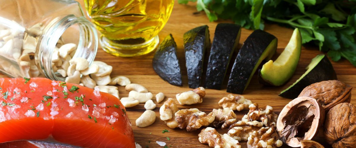 Salmon, assorted nuts and avocado slices