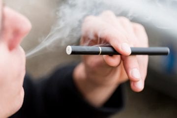 Man smoking an e-cigarette