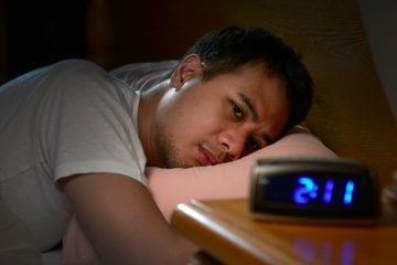man can't sleep during the COVID-19 pandemic