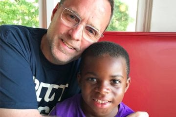 Rick Evans with his son.