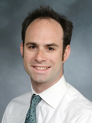 Headshot of Dr. Alexander Merkler