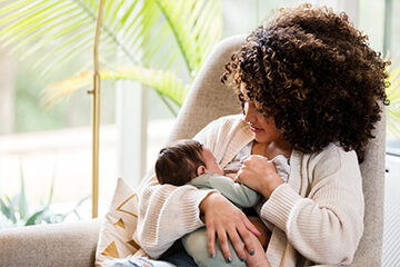 Mother breastfeeding a baby