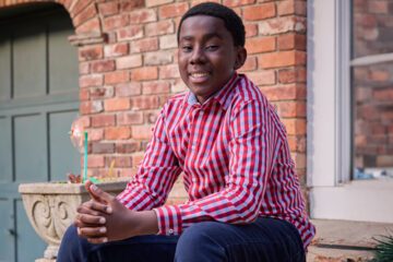Jonathan Lubin sitting outside his home